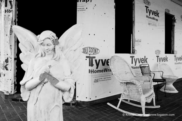 Statue of an angel in front of a house being rebuilt after hurricane Catarina in Bay Saint Louis, Louisiana