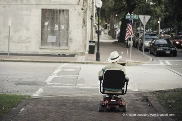 Man in an electric wheel chair in Savannah, Georgia