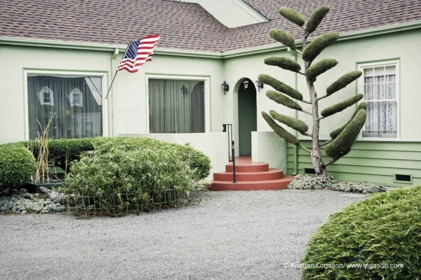 American flag in a courtyard of a green house in Ferndale, California