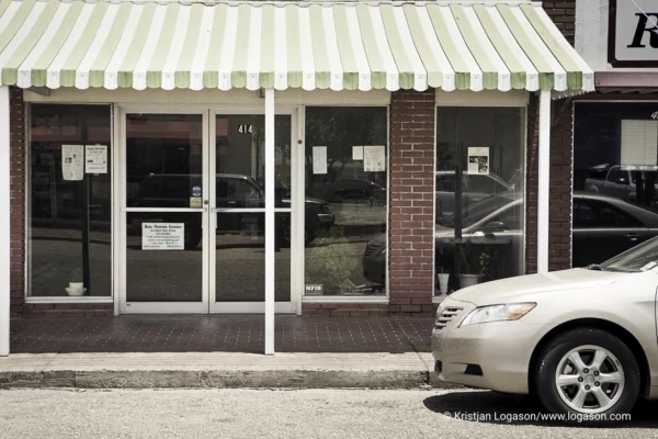 Empty shop and half a car