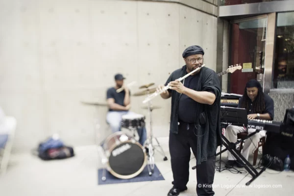 Flute player playing music in the streets of Baltimore
